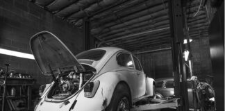 A picture of a Volkswagen Beetle getting some work done on it with some parts from MbenzGram (MBGRAM
