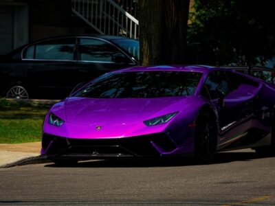 A purple exotic car similar to the classic and exotic cars that Woodside Credit creates loans for.